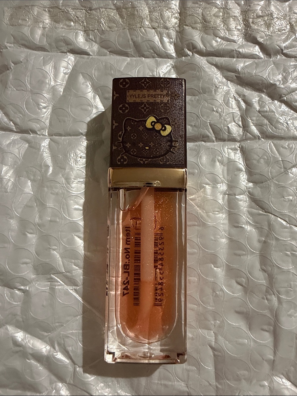 Hello Kitty Shimmery Peach Lip Gloss -